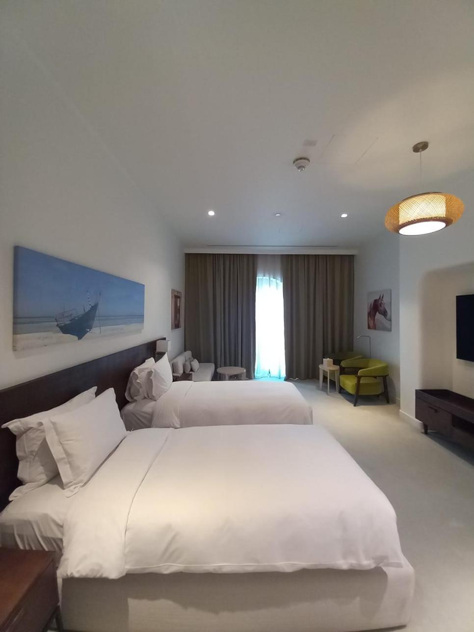 Mina Hotel And Residences By The Torch Доха Екстериор снимка A room at the hotel