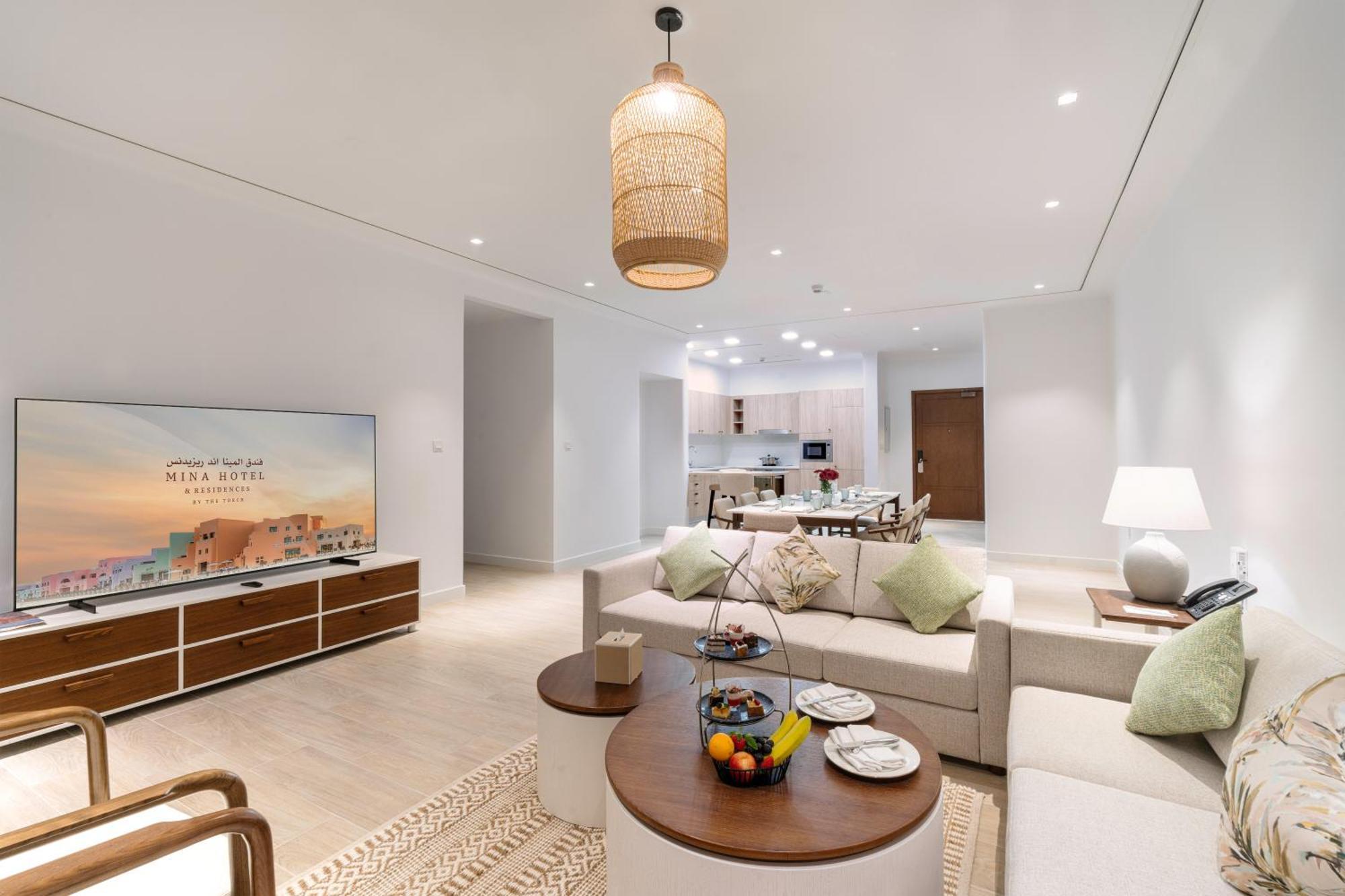 Mina Hotel And Residences By The Torch Доха Екстериор снимка A living room at the Ritz-Carlton, DIFC