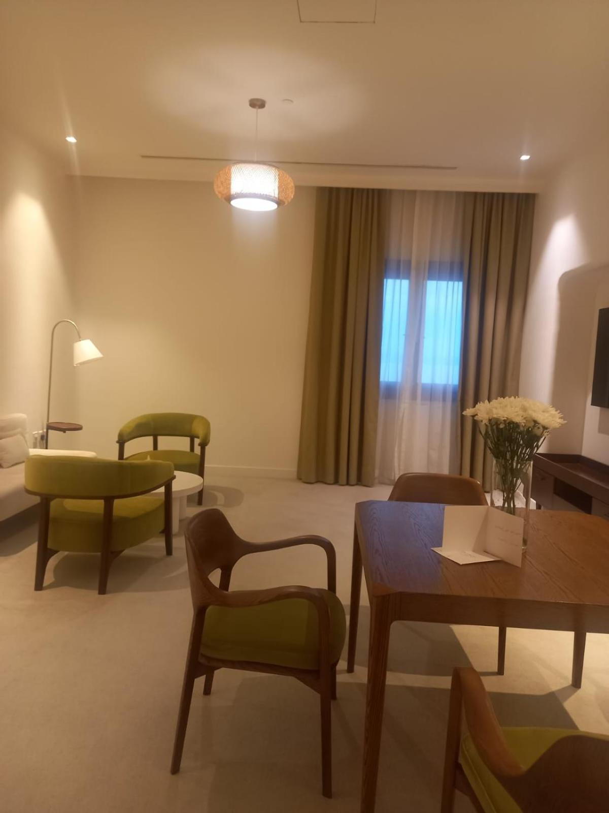 Mina Hotel And Residences By The Torch Доха Екстериор снимка A room at the hotel